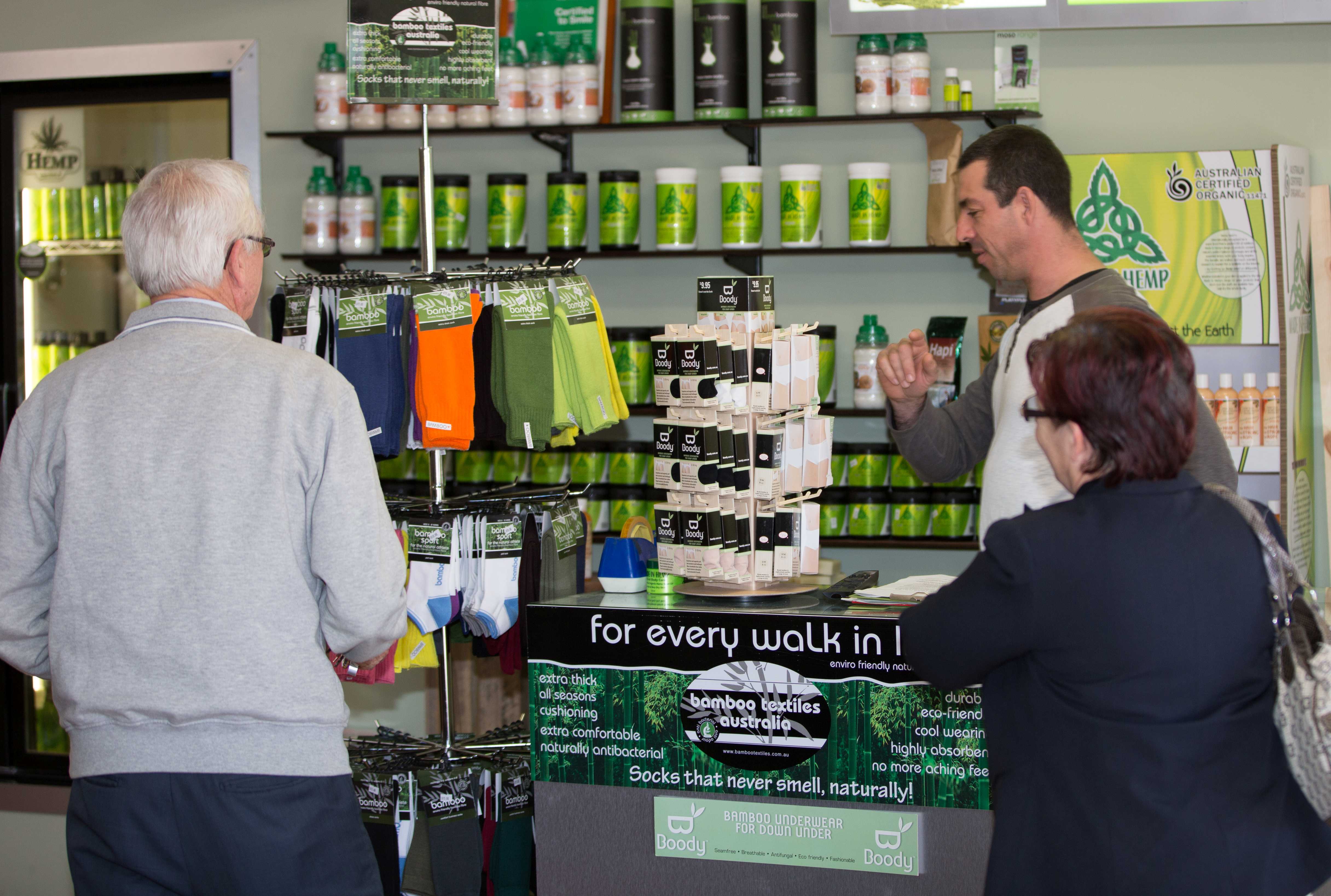 Darius speaking with customers inside Made In Hemp Long Jetty store in 2013