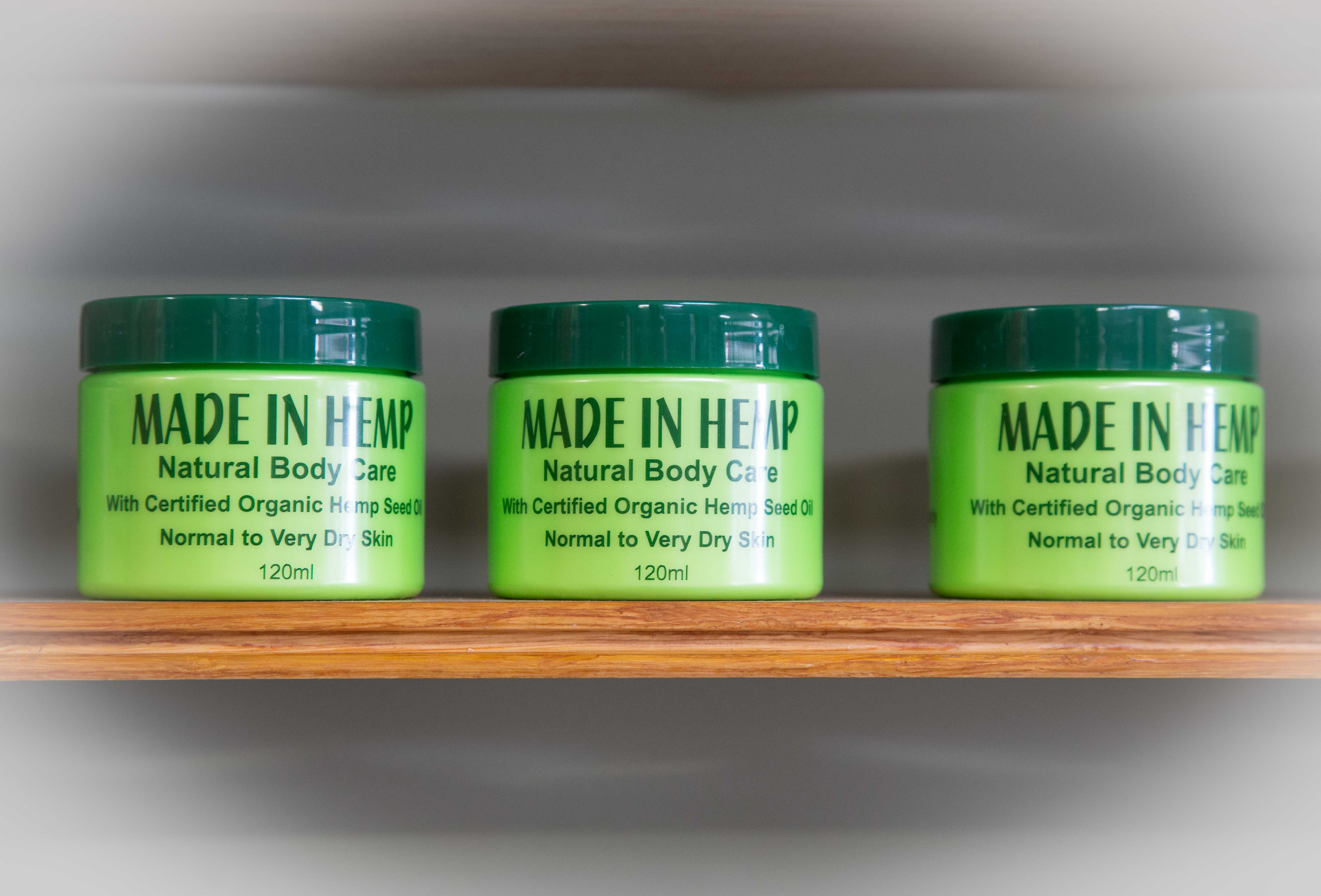 Early Made In Hemp natural body care jars on a shelf in 2013