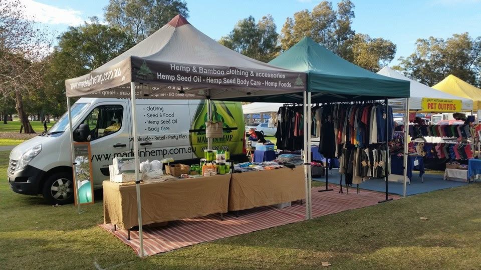 Made In Hemp outdoor market stall selling hemp and bamboo clothing, hemp seed oil, body care and hemp foods